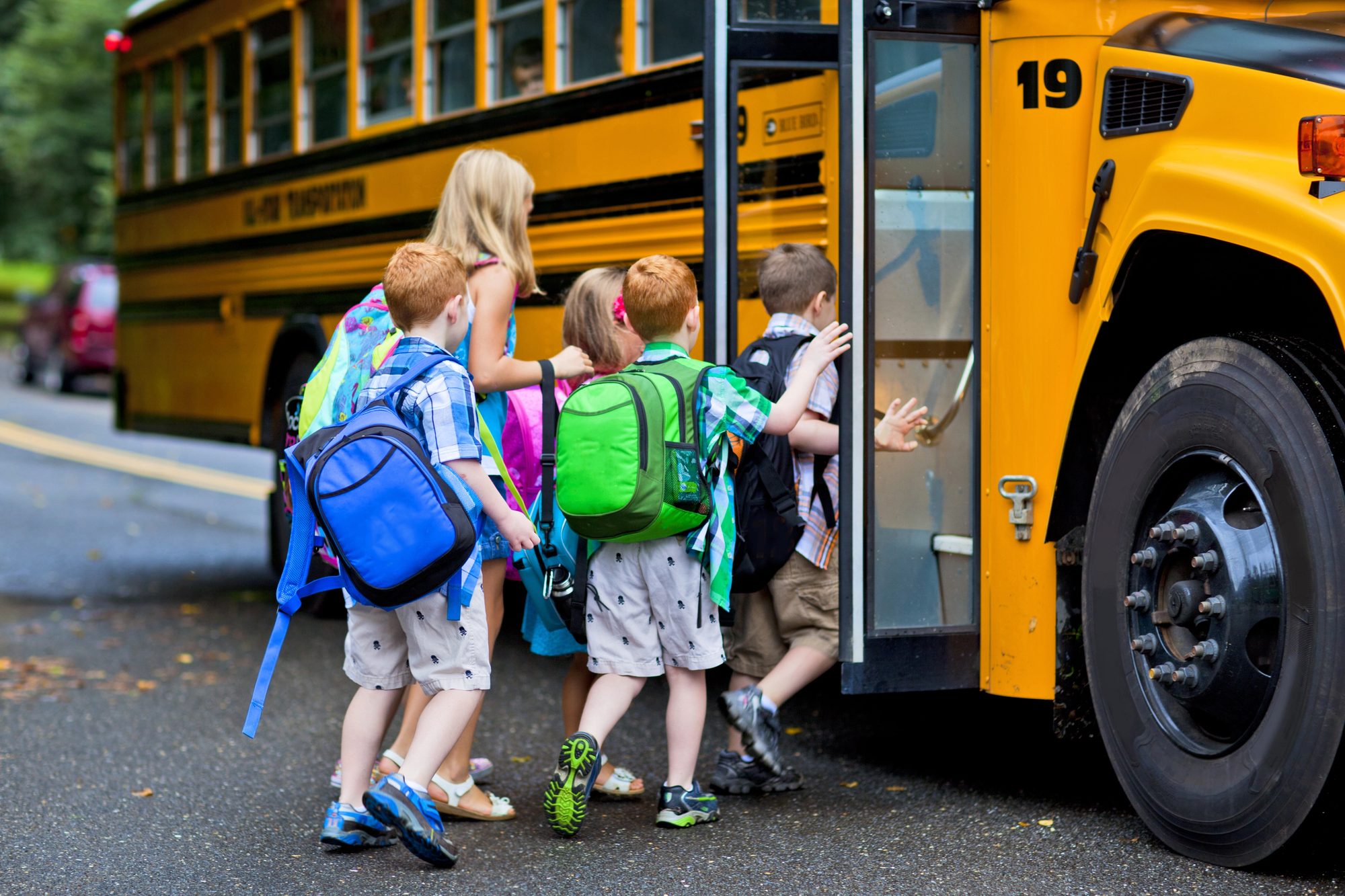 kids boarding school bus